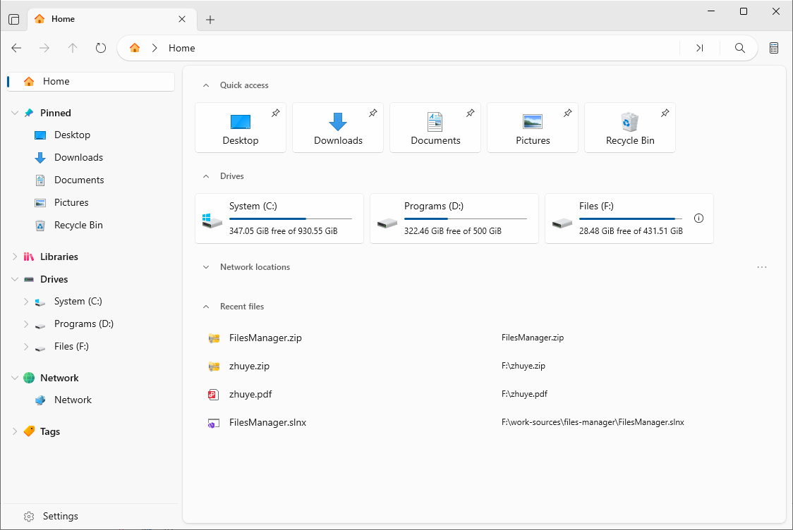 Files Manager home screen with Quick Access, Drives, and File Tags widgets